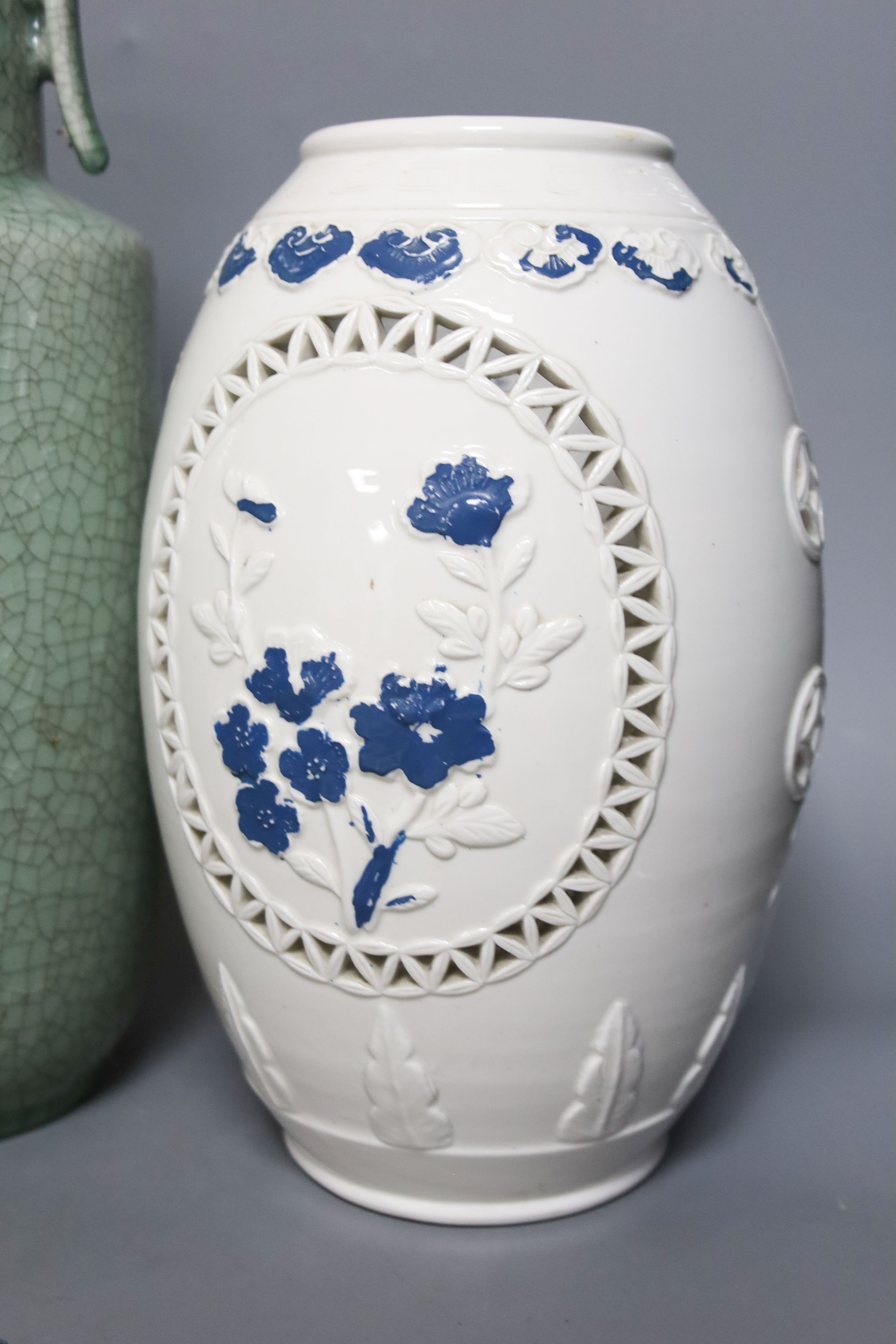 Four Chinese porcelain vases, one mounted as a lamp, 35cm